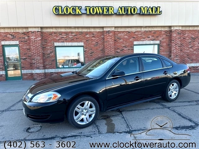 2014 Chevrolet Impala  Impala in front of Clock Tower Mall Used car business