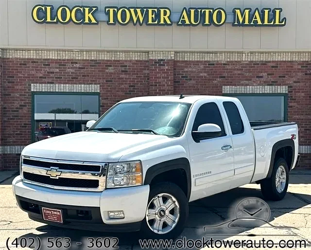 2017 Chevrolet Silverado  Silverado in front of Clock Tower Mall Used car business