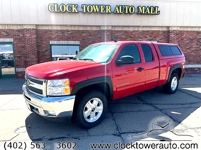 2013 Chevrolet Silverado  Silverado in front of Clock Tower Mall Used car business