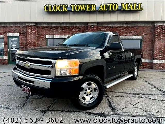 2011 Chevrolet Silverado  Silverado in front of Clock Tower Mall Used car business