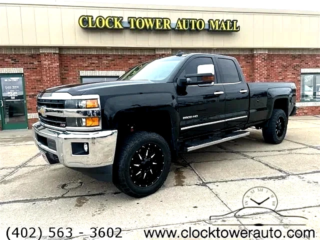 2018 Chevrolet Silverado  Silverado in front of Clock Tower Mall Used car business