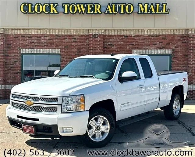 2012 Chevrolet Silverado  Silverado in front of Clock Tower Mall Used car business