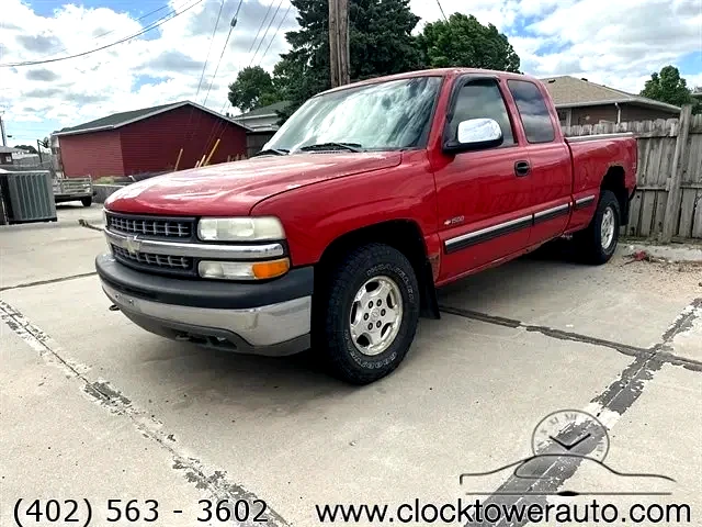 2002 Chevrolet Silverado  Silverado in front of Clock Tower Mall Used car business