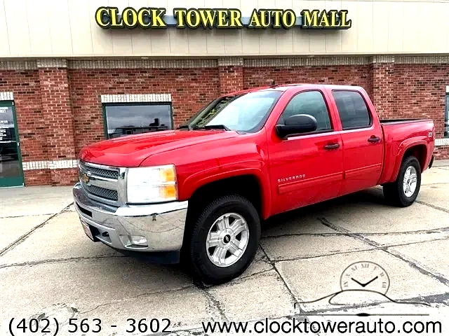 2013 Chevrolet Silverado  Silverado in front of Clock Tower Mall Used car business