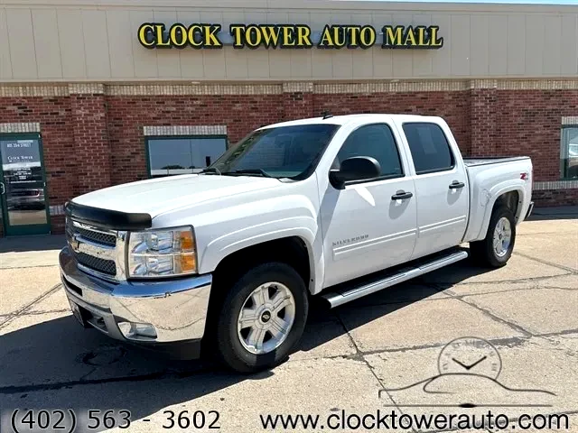 2012 Chevrolet Silverado  Silverado in front of Clock Tower Mall Used car business