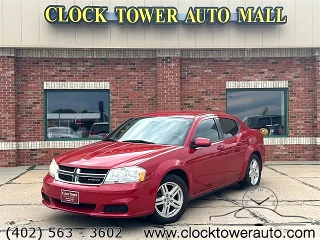 2011 Dodge Avenger  Avenger in front of Clock Tower Mall Used car business