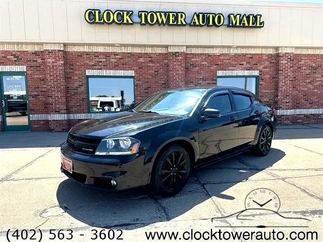 2013 Dodge Avenger  Avenger in front of Clock Tower Mall Used car business