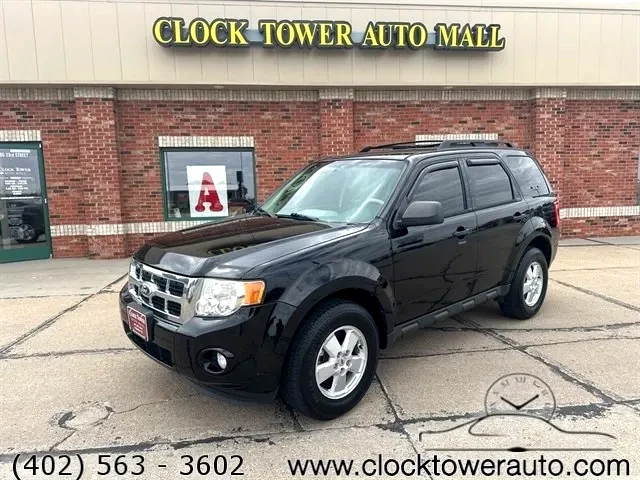 2010 Ford Escape  Escape in front of Clock Tower Mall Used car business