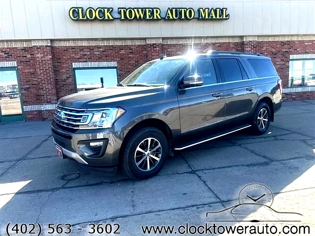 2018 Ford Expedition  Expedition in front of Clock Tower Mall Used car business