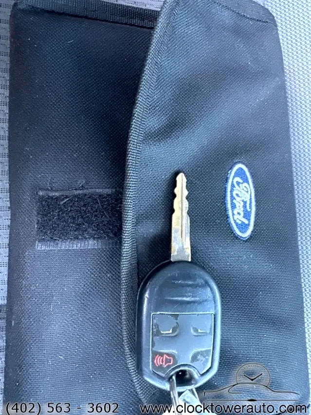 2011 Ford F-150  F-150 in front of Clock Tower Mall Used car business