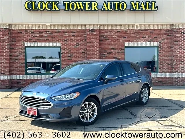 2019 Ford Fusion  Fusion in front of Clock Tower Mall Used car business