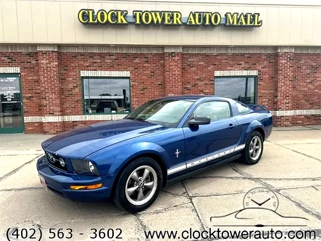 2006 Ford Mustang  Mustang in front of Clock Tower Mall Used car business