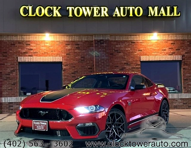 2021 Ford Mustang  Mustang in front of Clock Tower Mall Used car business