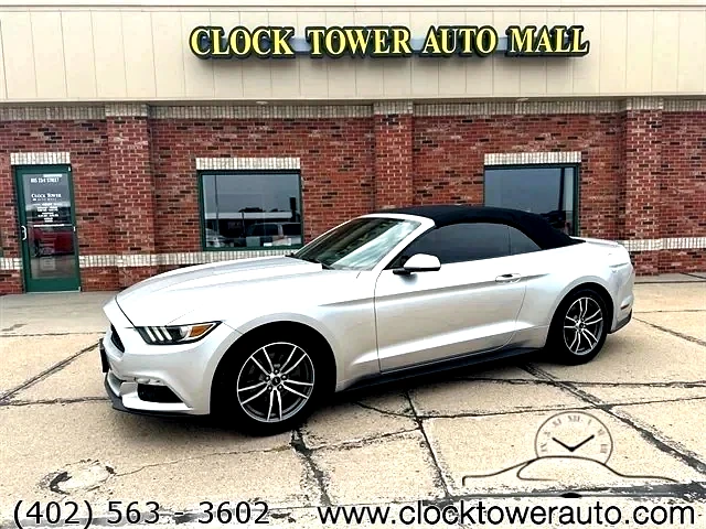 2016 Ford Mustang  Mustang in front of Clock Tower Mall Used car business