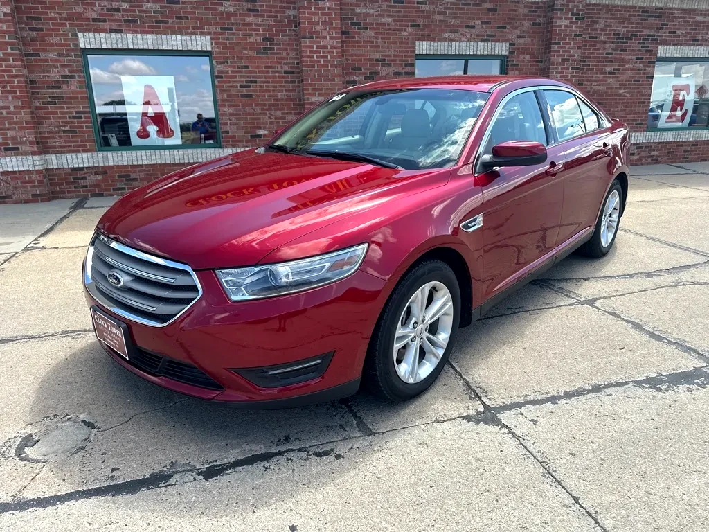 2014 Ford Taurus  Taurus in front of Clock Tower Mall Used car business