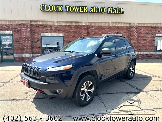 2015 Jeep Cherokee  Cherokee in front of Clock Tower Mall Used car business
