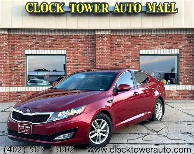 2013 Kia Optima  Optima in front of Clock Tower Mall Used car business