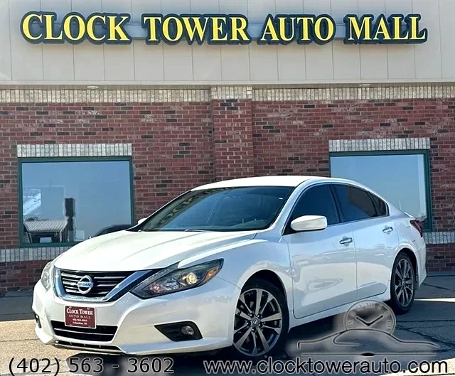 2018 Nissan Altima  Altima in front of Clock Tower Mall Used car business
