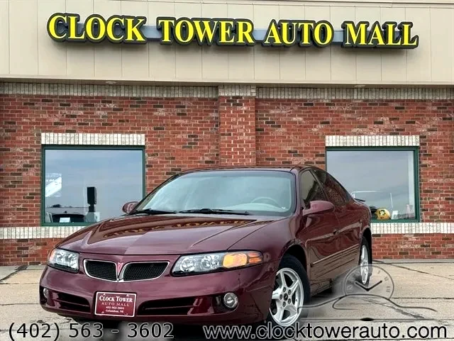 2002 Pontiac Bonneville  Bonneville in front of Clock Tower Mall Used car business