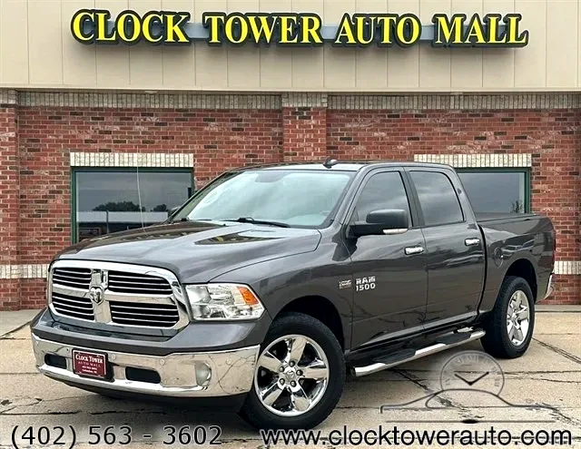 2017 RAM 1500  1500 in front of Clock Tower Mall Used car business