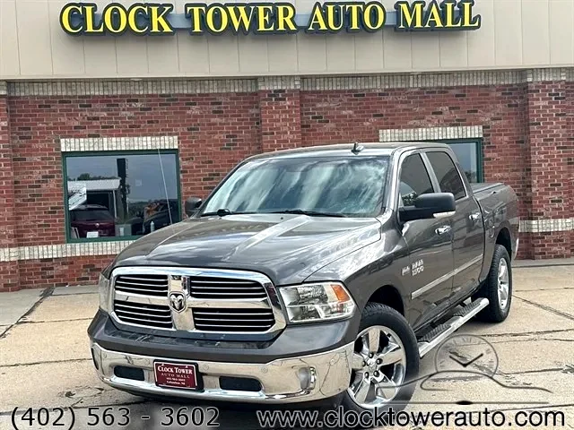 2016 RAM 1500  1500 in front of Clock Tower Mall Used car business