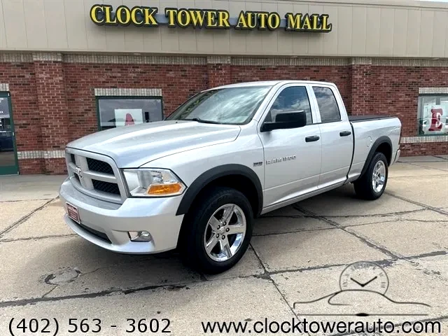2012 RAM 1500  1500 in front of Clock Tower Mall Used car business