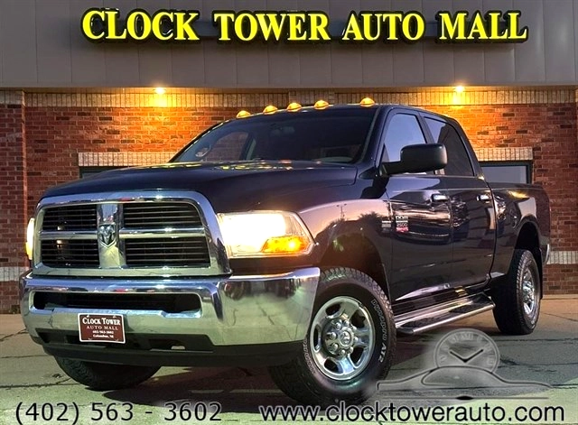2012 RAM 2500  2500 in front of Clock Tower Mall Used car business