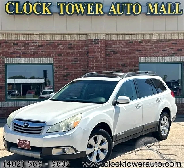 2011 Subaru Outback  Outback in front of Clock Tower Mall Used car business