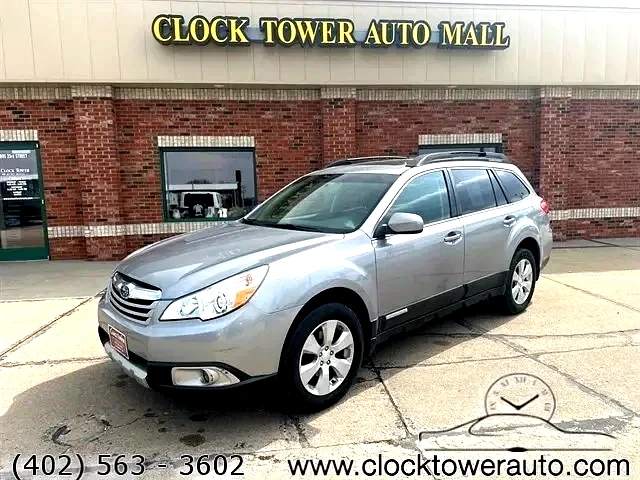 2011 Subaru Outback  Outback in front of Clock Tower Mall Used car business