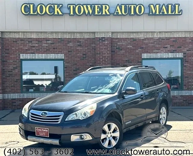 2011 Subaru Outback  Outback in front of Clock Tower Mall Used car business