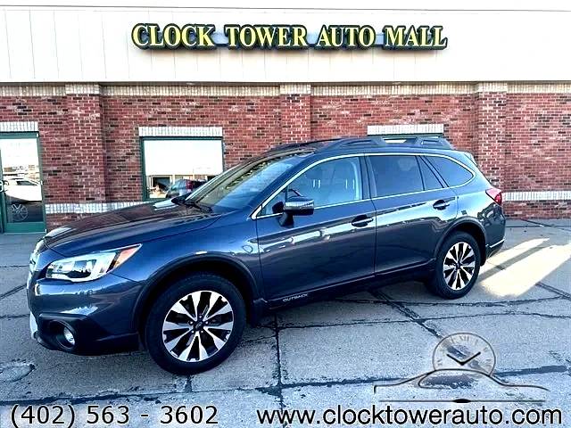 2017 Subaru Outback  Outback in front of Clock Tower Mall Used car business
