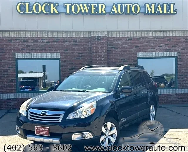 2012 Subaru Outback  Outback in front of Clock Tower Mall Used car business