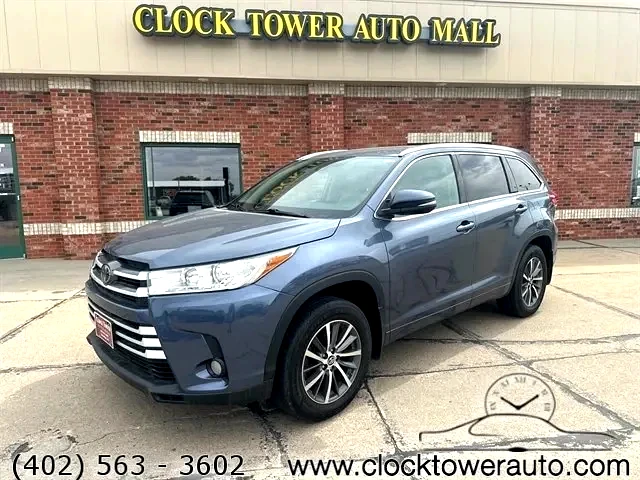 2018 Toyota Highlander  Highlander in front of Clock Tower Mall Used car business