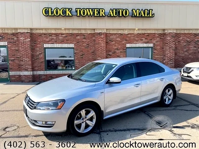 2015 Volkswagen Passat  Passat in front of Clock Tower Mall Used car business